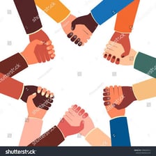 A group of people joining hands to symbolize unity