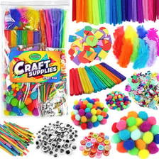 An assortment of paint, brushes, paper, and craft supplies