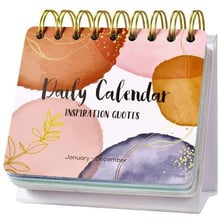 A desk calendar displaying individual daily pages.