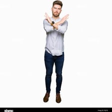A person emphatically refusing with crossed arms