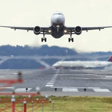 An airplane descending toward a runway.