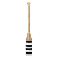 Wooden oar displayed horizontally on a boathouse wall