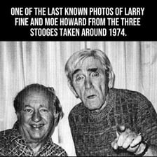Moe Howard and Larry Fine performing as members of the Three Stooges.