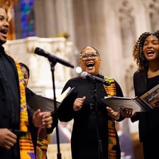 A choir chanting in a church.