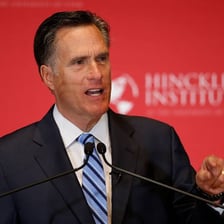 Portraits of Mitt Romney and Ken Jennings.