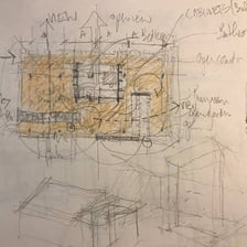 An architect working on preliminary sketches and drafts
