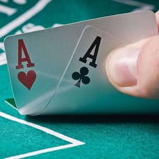 Two ace playing cards shown as a poker player’s hole cards.
