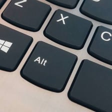 A computer keyboard with the Alt key visible