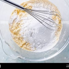 Different ingredients being blended together in a bowl