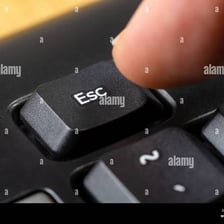 A close-up of a computer keyboard’s Esc key
