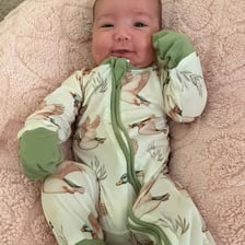 A newborn baby prompting an affectionate reaction