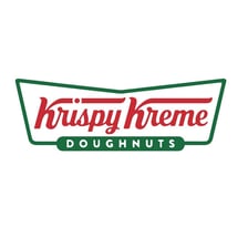 A Krispy Kreme sign displayed at a doughnut shop.
