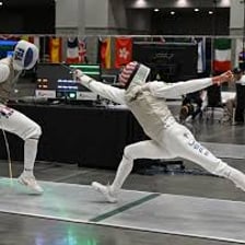 Fencer making a deceptive attack movement