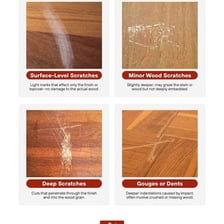 A wooden surface with visible scuff marks