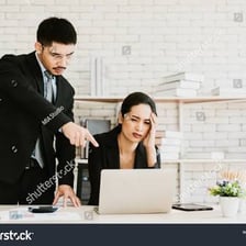 A supervisor giving instructions to an employee.