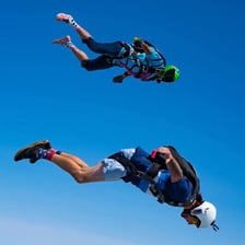 A skydiver in free fall during an extreme sport.