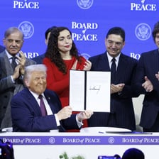 Representatives signing a formal peace agreement.