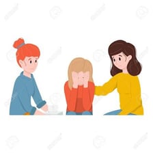 Two people having a reassuring conversation