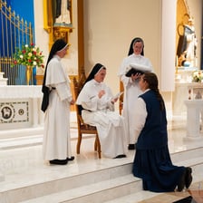 A group of Catholic nuns wearing religious habits.