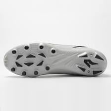 The studded underside of an athletic shoe designed to provide traction.