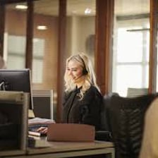 A paralegal working at a desk with legal documents