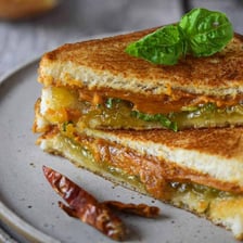 A BLT sandwich and a peanut butter and jelly sandwich