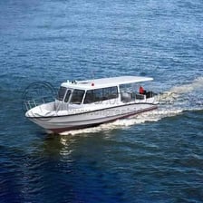 A passenger boat traveling across the water
