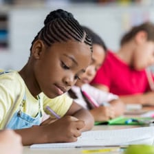 A student taking a written examination