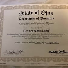 A high-school-equivalency certificate and study materials.
