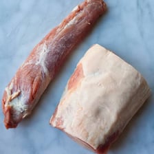 A loin cut of meat prepared for cooking.