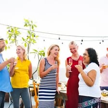 People chatting casually at a social gathering