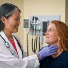 A primary care physician consulting with a patient
