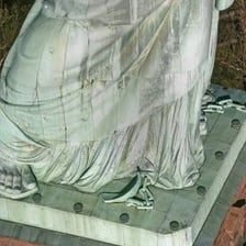 A close view of the Statue of Liberty’s foot and toes.