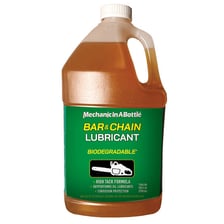 A bottle of lubricant used on moving machinery