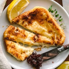 A wedge of feta cheese, a familiar Greek food.