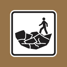 A person approaching a hazard without noticing the warning