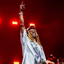 Rapper Lil Wayne performing onstage