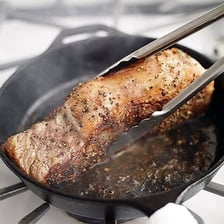 Food being scorched in a hot pan