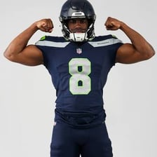 A first-year professional athlete in a team uniform