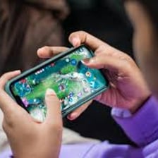 A person playing a game on a smartphone