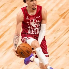 LaMelo Ball playing basketball.