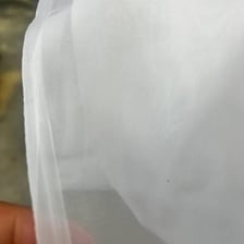 A close-up of lightweight transparent fabric.