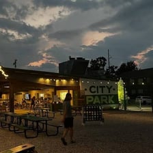 A park beneath the fading light of dusk