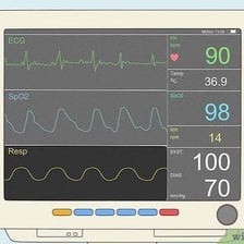 A medical monitor displaying vital signs