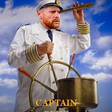 A sailor on a ship using the traditional nautical response “aye.”