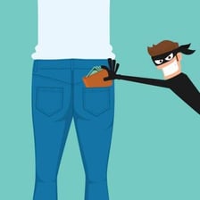 A hand taking an object in an act of theft