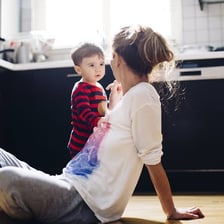 An adult speaking sternly to a child