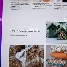 A screen displaying vintage goods for sale on Etsy.