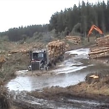 A vehicle bogged down in deep mud