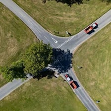 Two roads meeting at a clearly defined crossroads